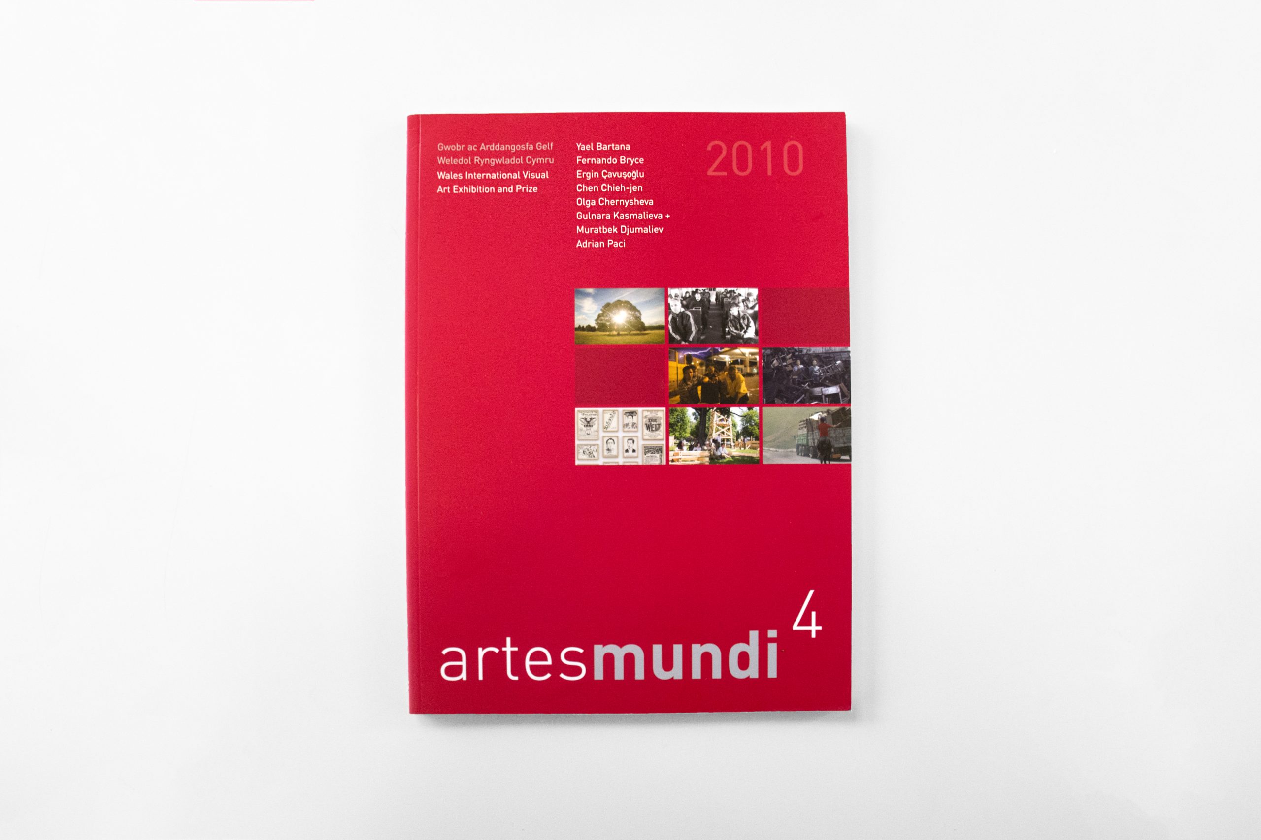 Artes Mundi 4 Catalogue front cover, a berry red with thumbnail images to the centre right of the cover.