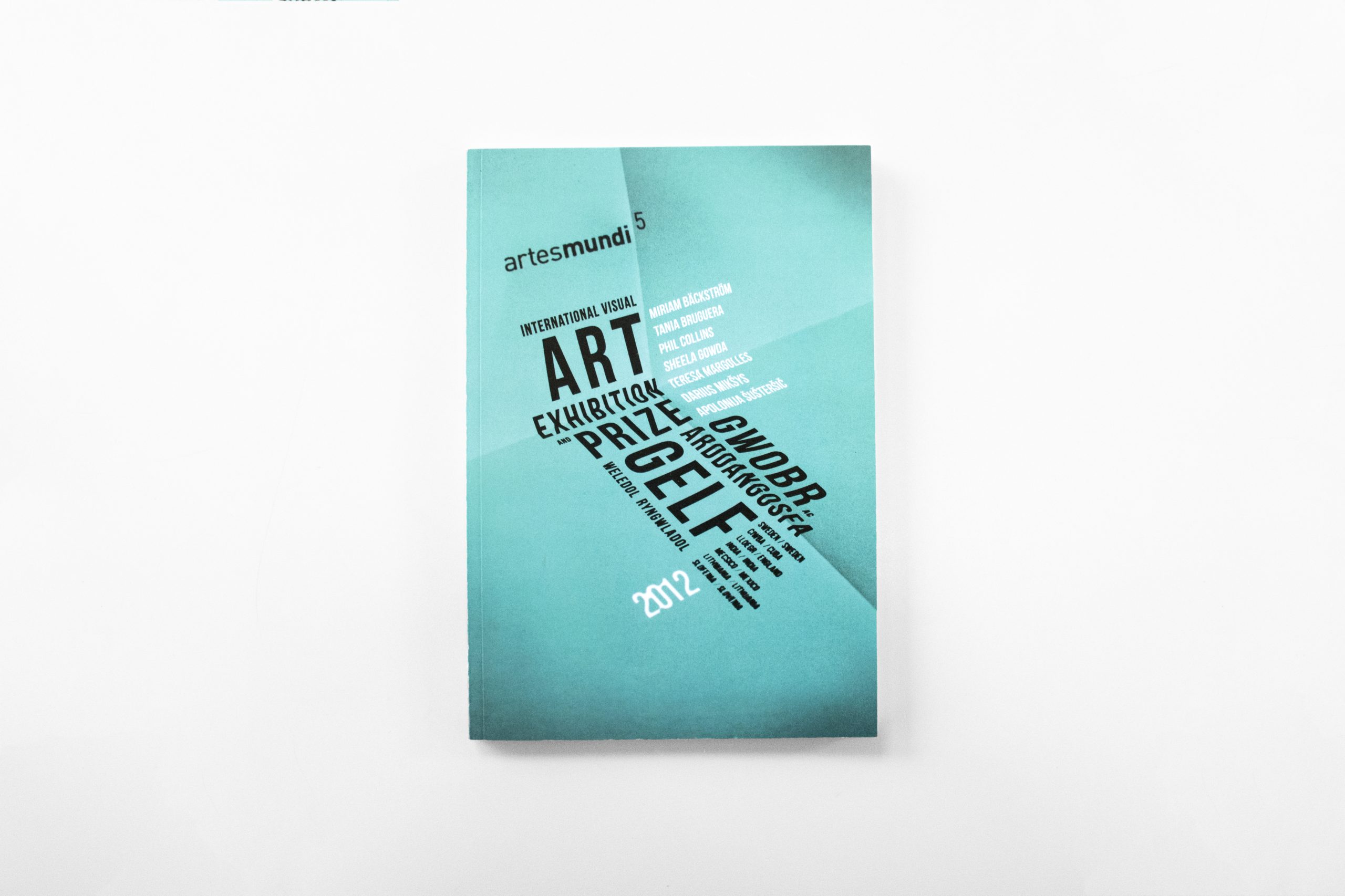 Artes Mundi 5 Catalogue cover, the front is a light teal graphic with black and white text at different angles.
