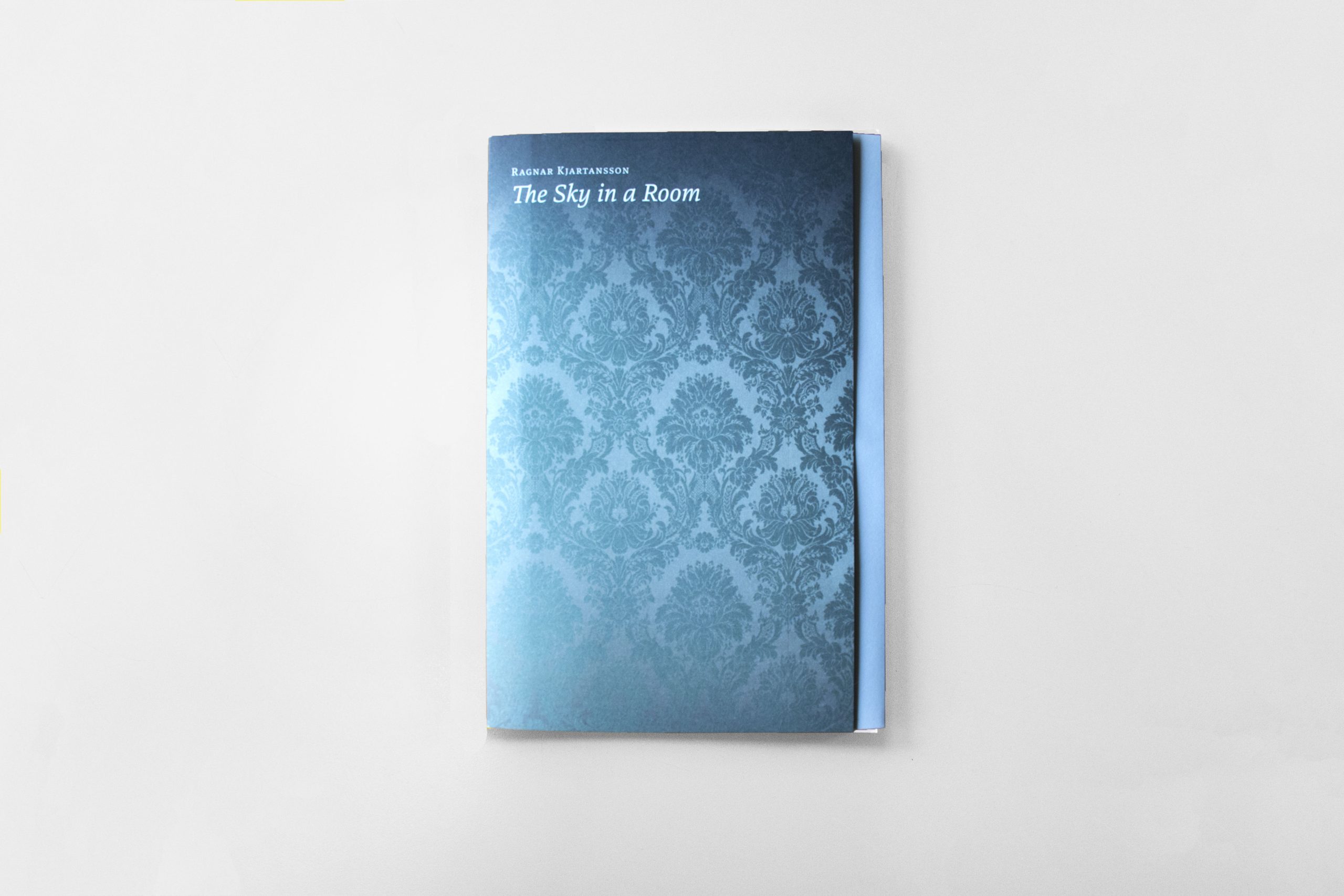 Ragnar Kjartansson Booklet, frot conver featuring teal blue ornate paterning.