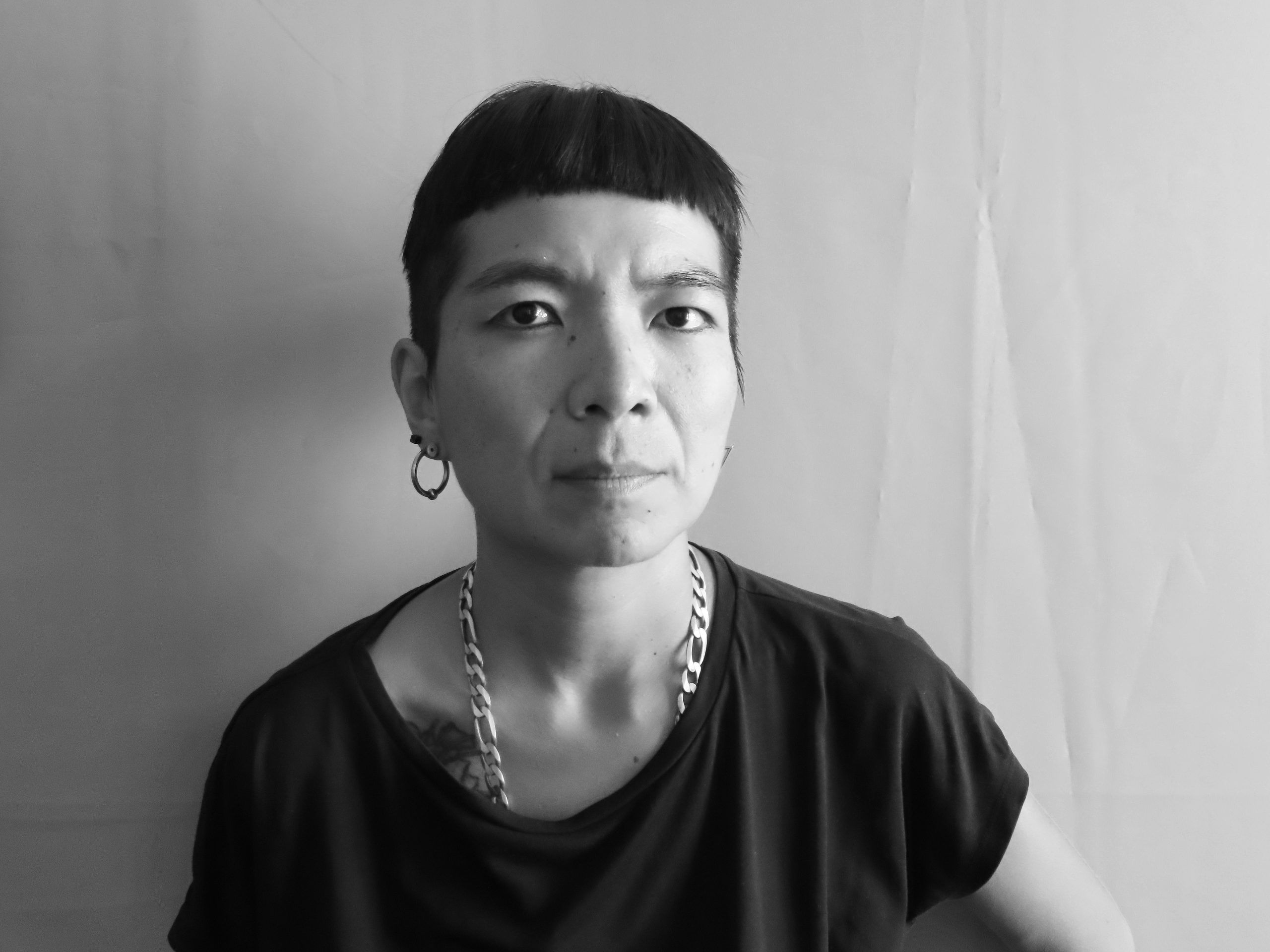 A black and white portrait image of Artes Mundi 10 selected artist, Naomi Rincón Gallardo