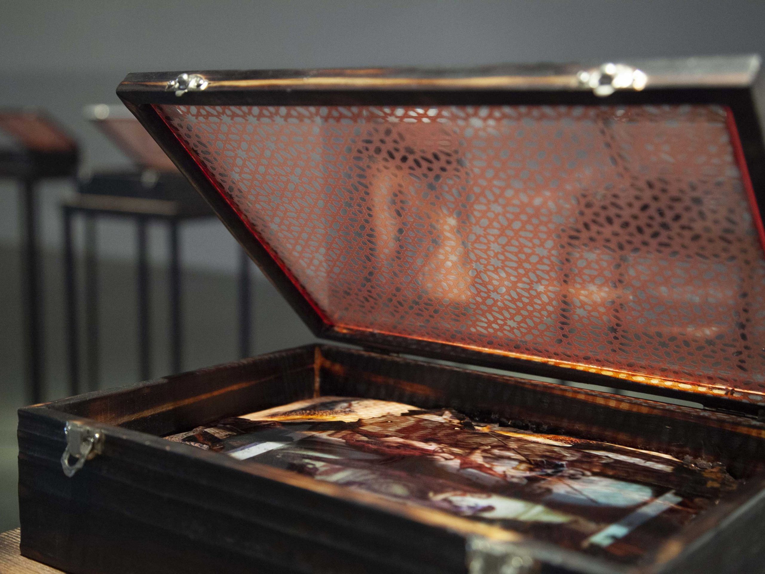Rushdi Anwar, We have found in the ashes what we lost in the fire, 2018. Mixed medium embedded within wooden box. 12 boxes, each 32.5 x 22.5 x 9 cm. Installation dimensions variable. Courtesy the artist. Home