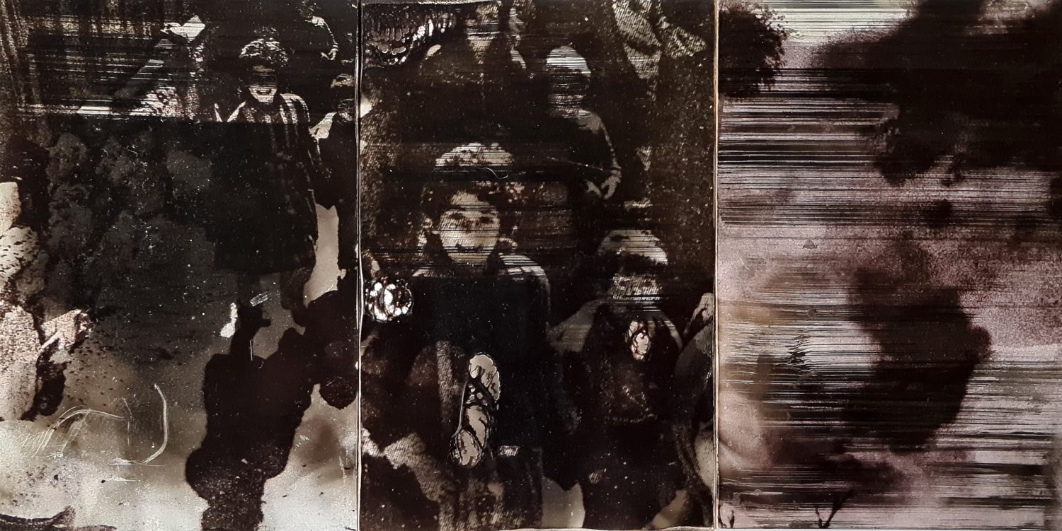 A photograph print treated with Smoke (soot) mounted on wooden boards.