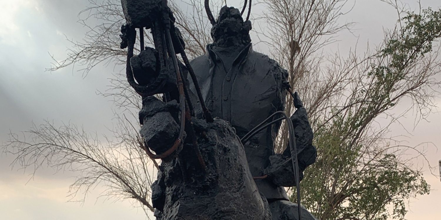 A life-size replica of a decimated monument of the Yazidis military hero Ezidi Mirza. Re-fashioned in brass, Ezidi Mirza sits atop his horse, his legs bare iron, his body clinging to what remains of his steed.