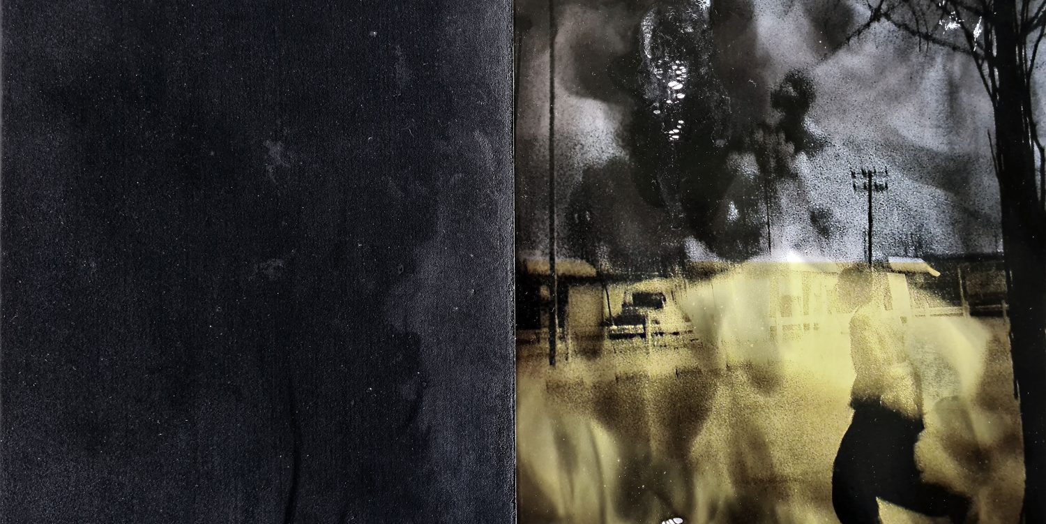 An up-close detail photo of a print treated with smoke, next to smoke on sandpaper.
